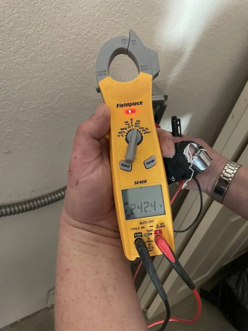Voltage testing with clamp meter during Outlet Installation in Mount Sterling